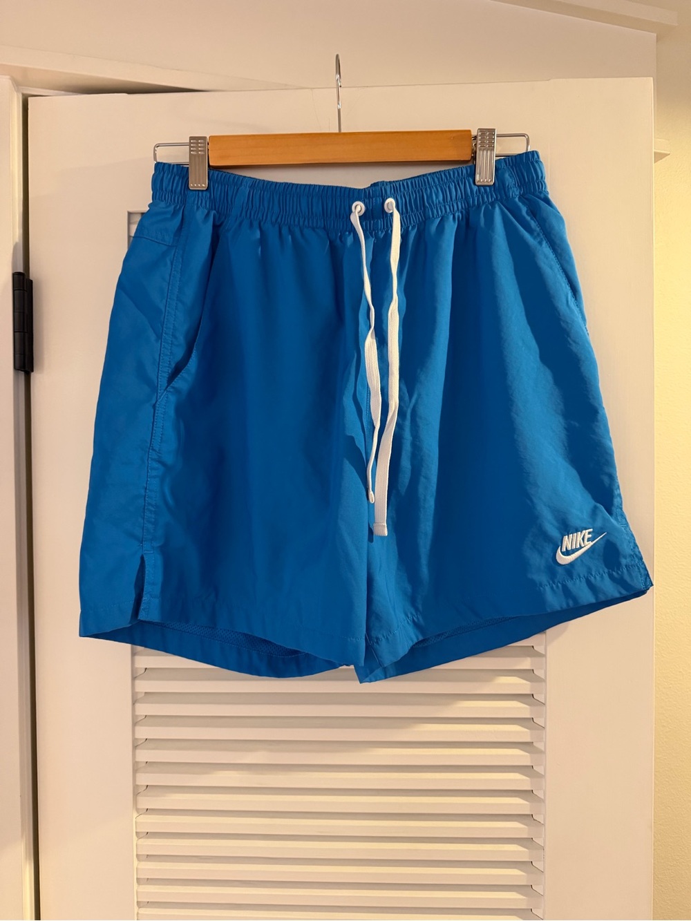 Nike Men's woven flow shorts- Athletic Shorts Blue with White Drawcord